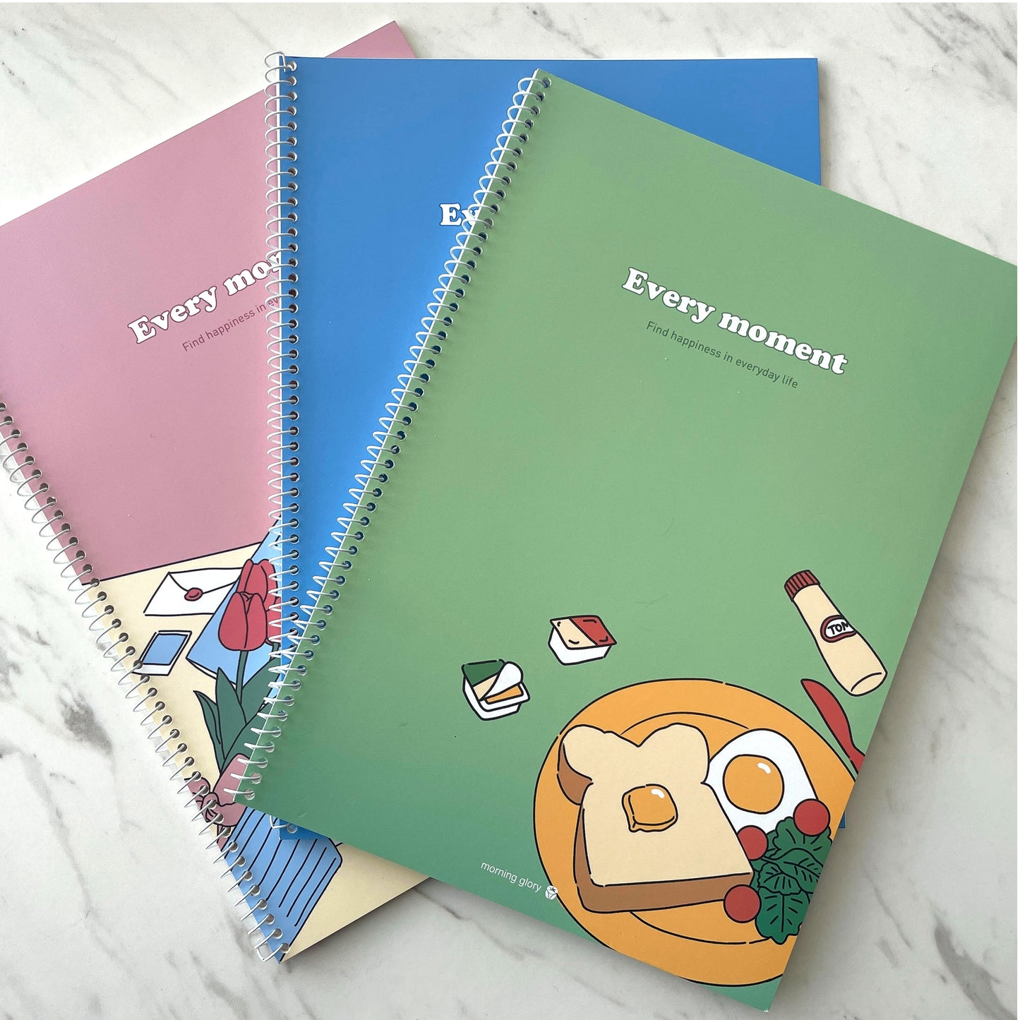 Korean spiral notebook with illustrations of toast, roses, and cheese